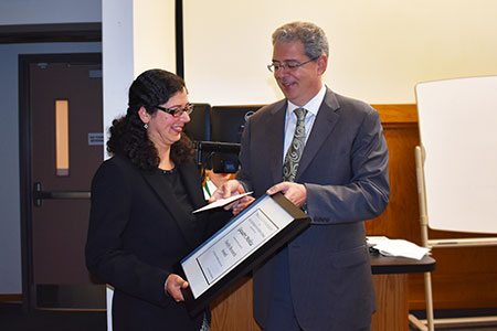 Dr. Mehta receives award from the dean
